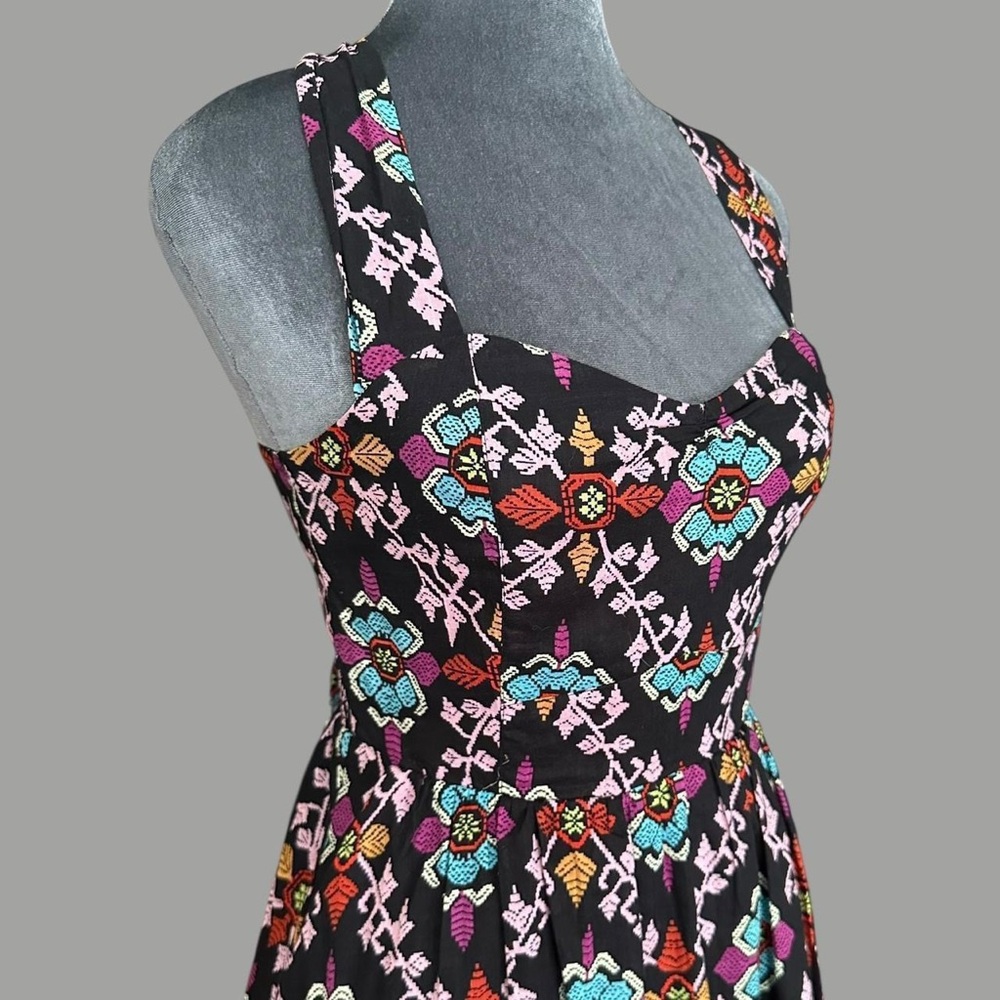 Edme & Esyllte black cotton halter mini dress with retro geometric floral print